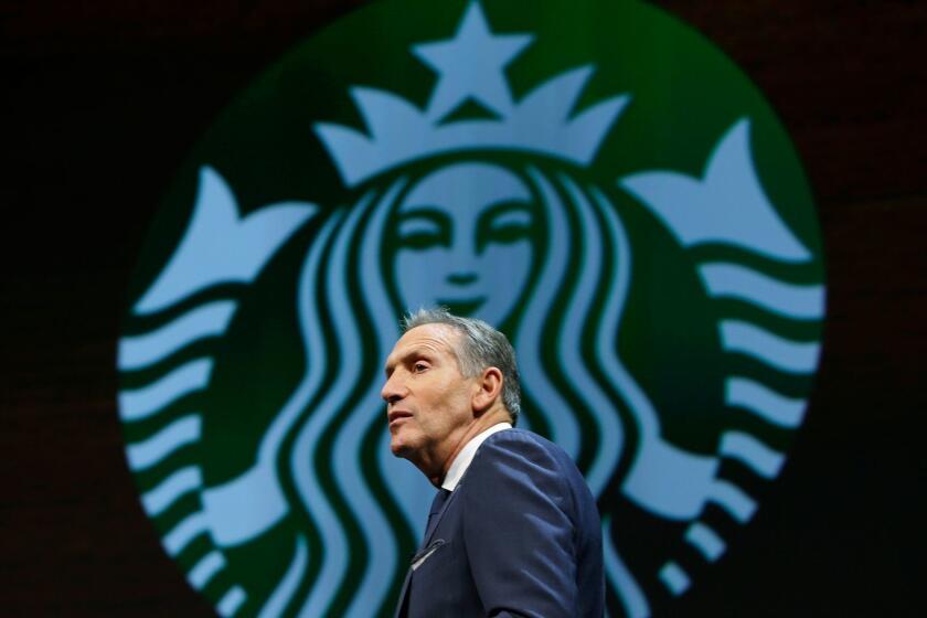 Howard Schultz, shown March 23, is stepping down as Starbucks' CEO and become the company's executive chairman.