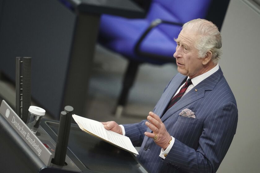 Britain's King Charles III speaks in the German parliament Bundestag on the second day of his trip to Germany in Berlin, Thursday, March 30, 2023. Before his coronation in May 2023, the British King and his royal wife will visit Germany for three days.( Kay Nietfeld/dpa via AP)