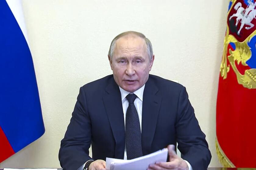 FILE - In this photo taken from video released by the Russian Presidential Press Service, Russian President Vladimir Putin speaks via videoconference at the Novo-Ogaryovo residence outside Moscow, Russia, Wednesday, March 16, 2022. (Russian Presidential Press Service via AP, File)