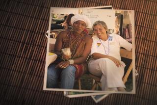 An image of a photograph showing two women sitting down