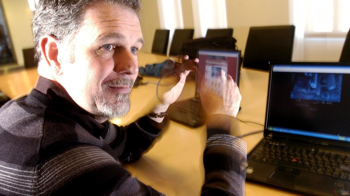 Reed Hastings, CEO of Netflix, shows off his new streaming service in 2007.