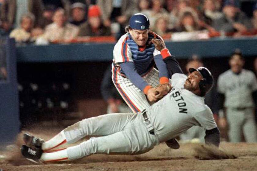 Gary Carter tags Jim Rice out at the plate during Game 6 of the 1986 World Series.