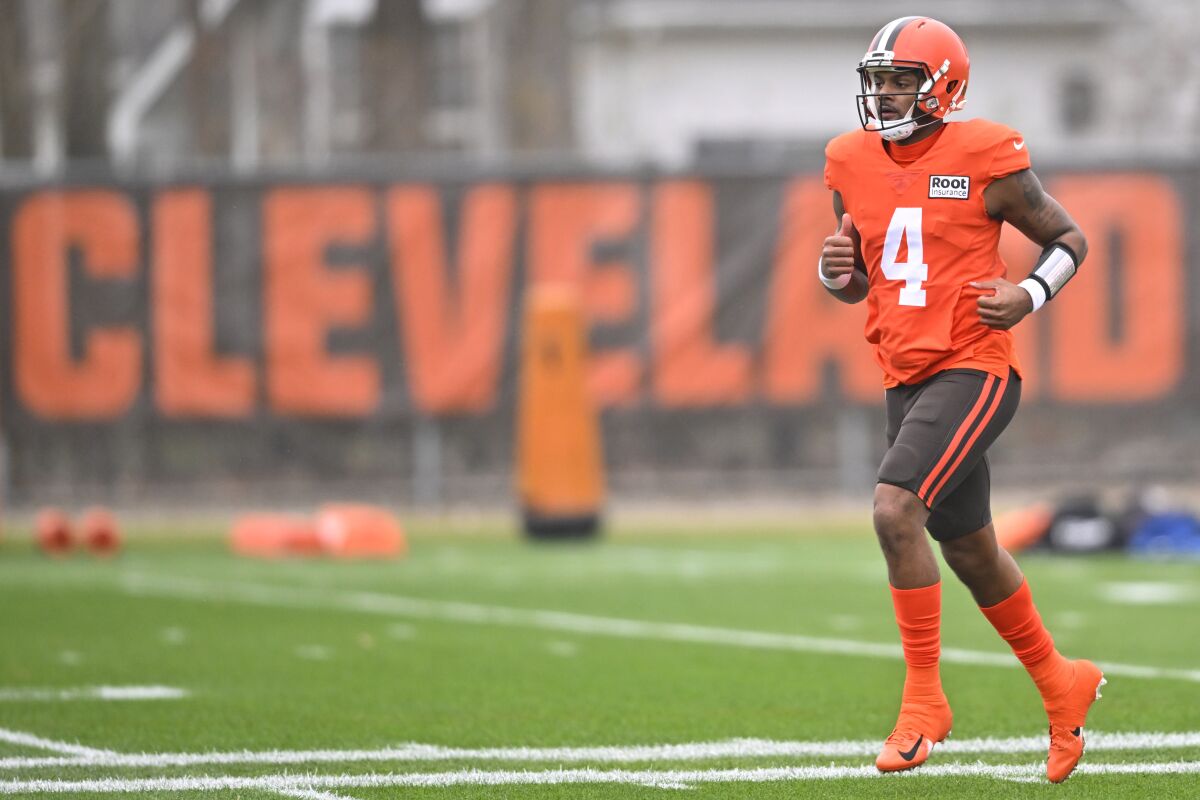 Cleveland Browns quarterback Deshaun Watson runs on the field during an NFL football practice at the team's training facility Wednesday, Nov. 16, 2022, in Berea, Ohio. (AP Photo/David Richard)