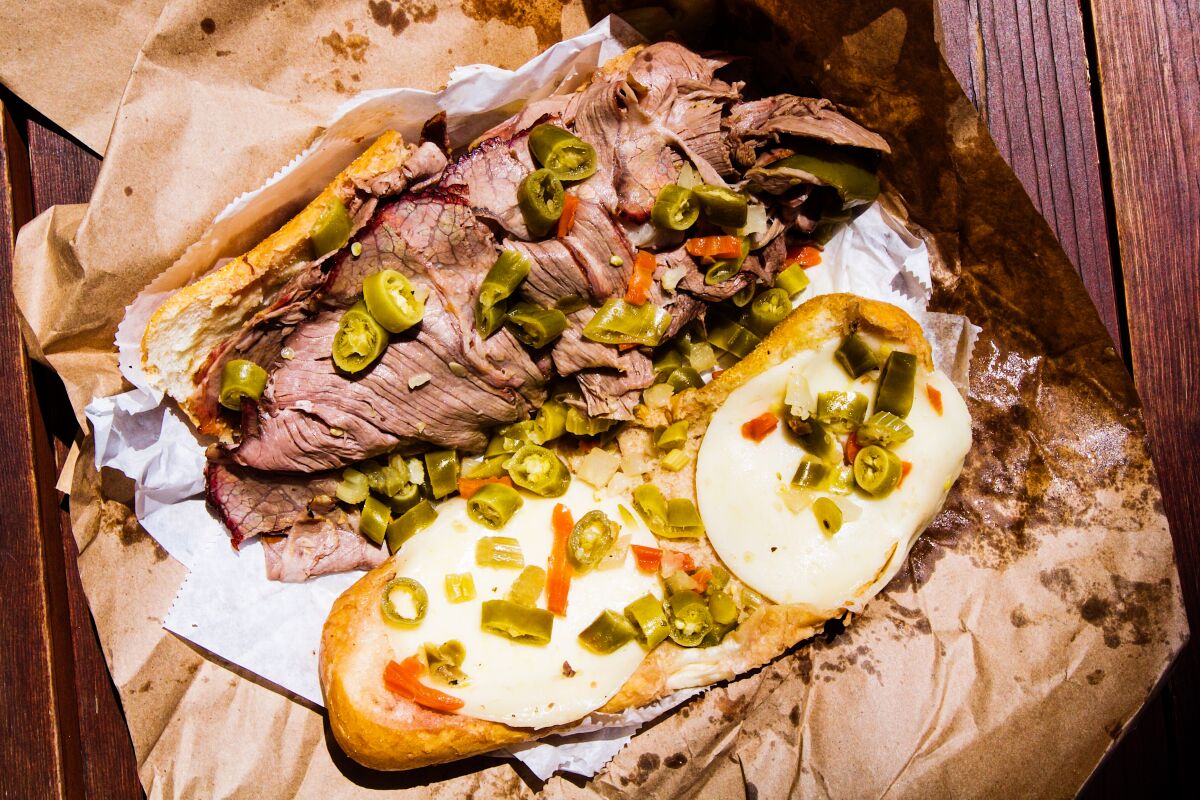An overhead photo of the Bear sandwich at Eastside Italian Deli, with provolone cheese, giardiniera and roast beef