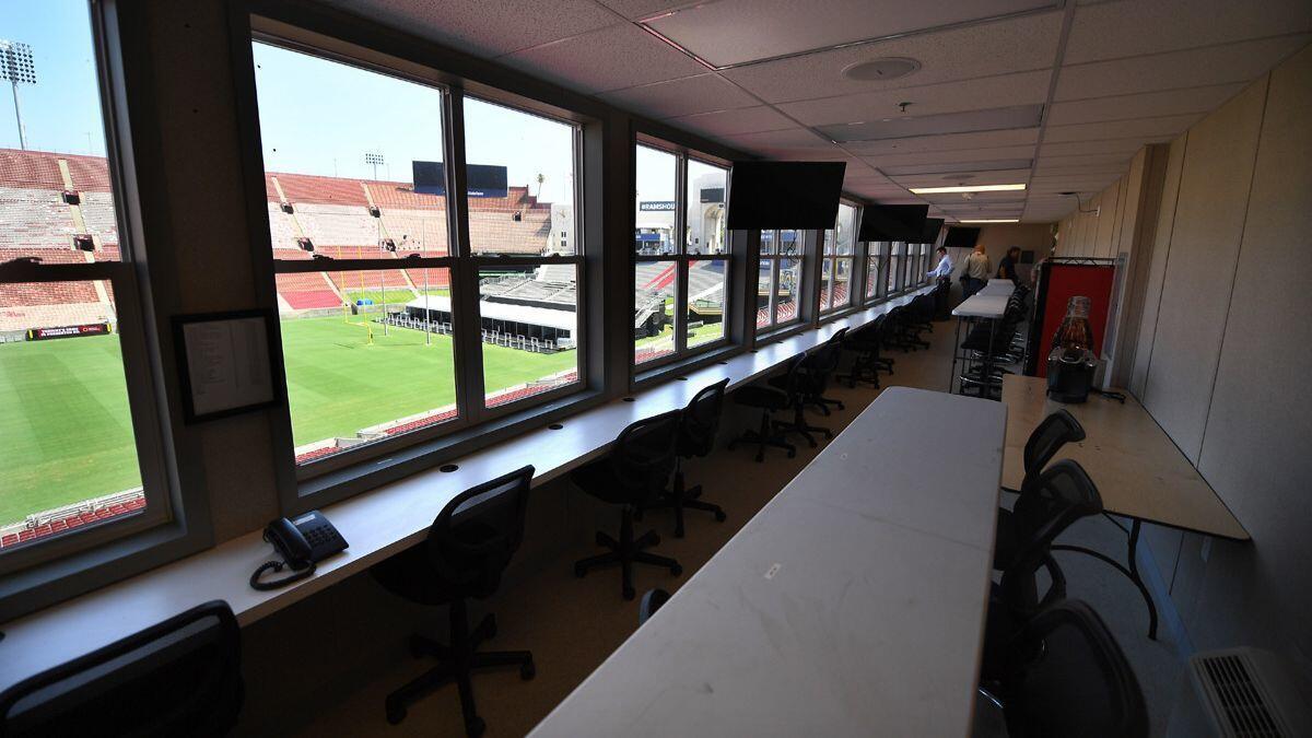 An interior view of the temporary press box at the Coliseum.