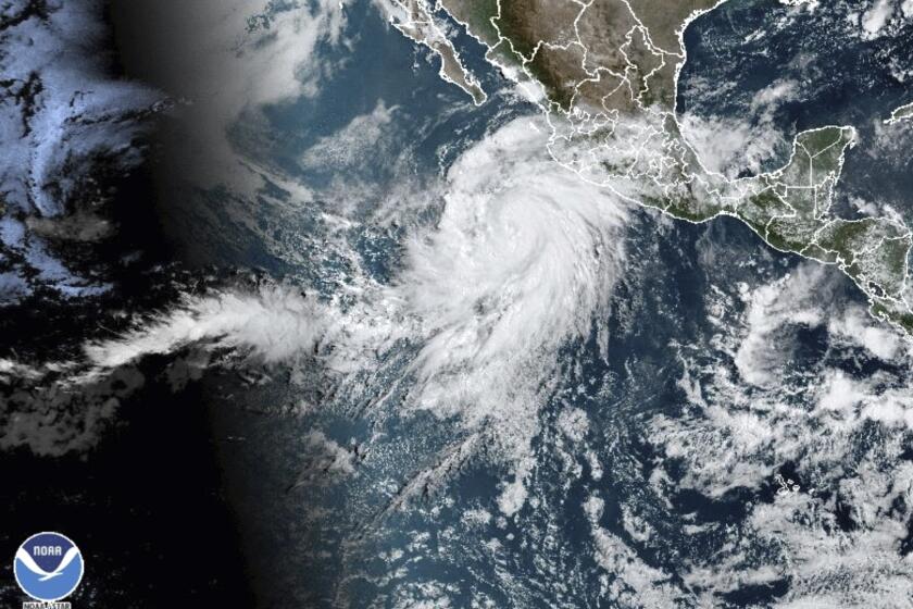 A satellite image taken Thursday morning shows Hurricane Hilary off the Pacific coast of Mexico.