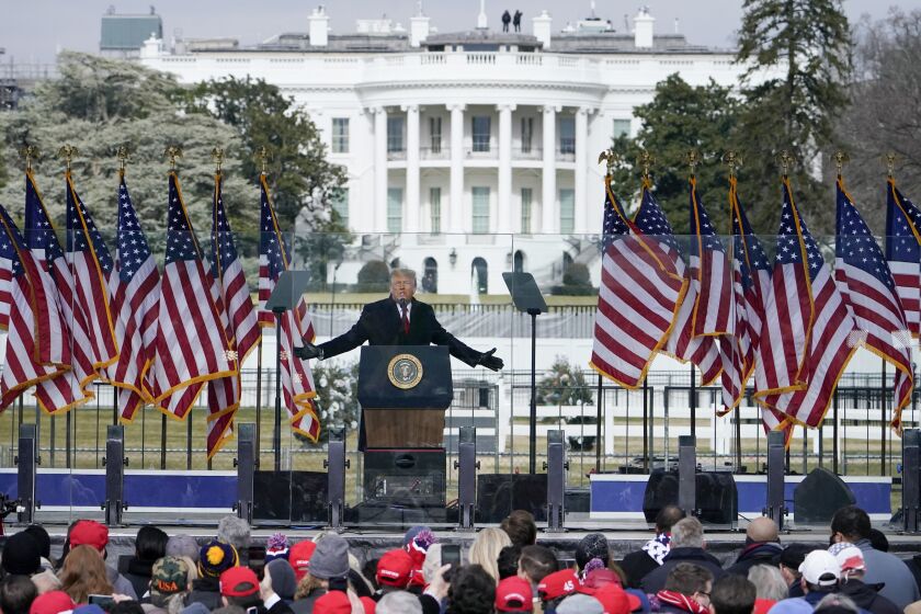 FILE - In this Jan. 6, 2021, file photo with the White House in the background, President Donald Trump speaks at a rally in Washington. The request seeks records about events leading up to the Jan. 6 attack, including communication within the White House and other agencies, and information about planning and funding for rallies held in Washington, including an event at the Ellipse featuring then-President Donald Trump before thousands of his supporters stormed the Capitol. (AP Photo/Jacquelyn Martin, File)