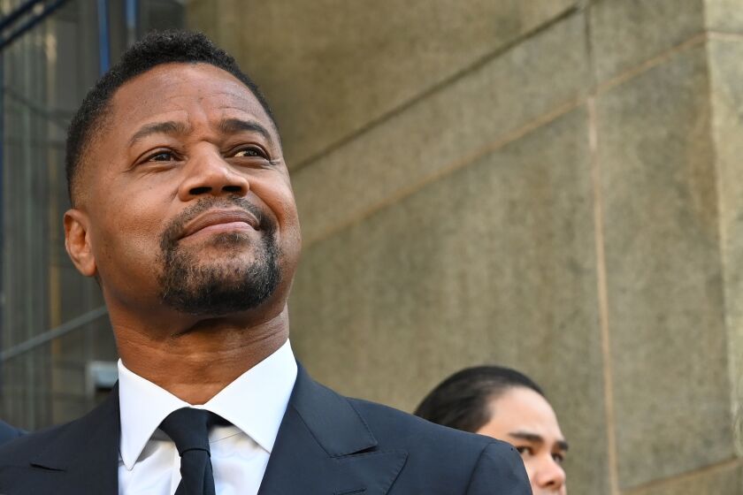 Oscar-winning actor Cuba Gooding Jr. looks up as he departs his court arraignment in New York on October 15, 2019, where new charges are to be unsealed on his sexual assault case. - Gooding has previously been charged with forcible touching and sex abuse in relation to an alleged groping incident at a New York bar. (Photo by TIMOTHY A. CLARY / AFP) (Photo by TIMOTHY A. CLARY/AFP via Getty Images)