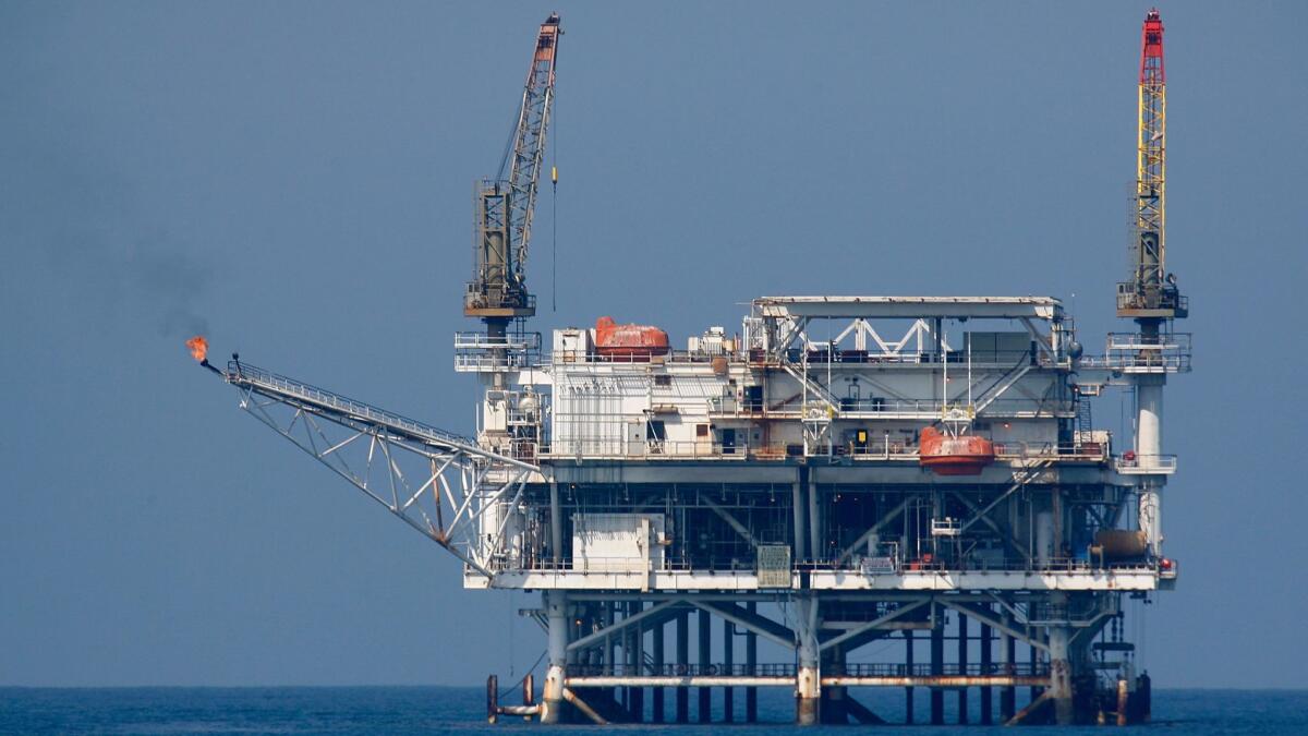 The Laguna Beach City Council on Tuesday unanimously adopted a resolution that opposes new oil and gas drilling off California's coast. This 2010 photo shows an oil rig in the Catalina Channel.