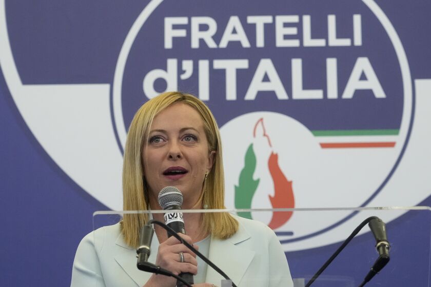 Far-Right party Brothers of Italy's leader Giorgia Meloni speaks to the media at her party's electoral headquarters in Rome, early Monday, Sept. 26, 2022. Italians voted in a national election that might yield the nation's first government led by the far right since the end of World War II. (AP Photo/Gregorio Borgia)