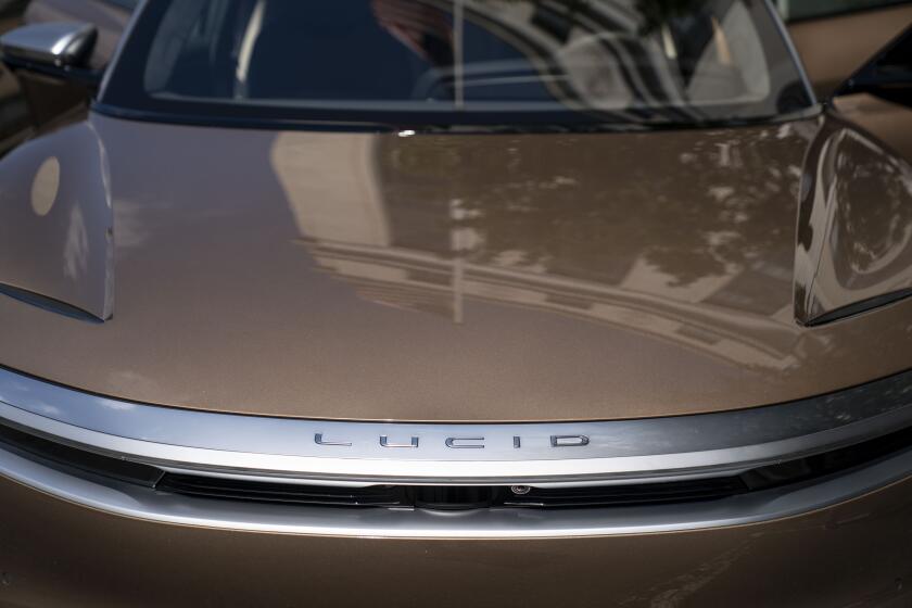 WASHINGTON, DC - JULY 20: Lucid Motors electric cars are seen parked outside the Dirksen Senate Office Building on Capitol Hill on Wednesday, July 20, 2022 in Washington, DC. (Kent Nishimura / Los Angeles Times)
