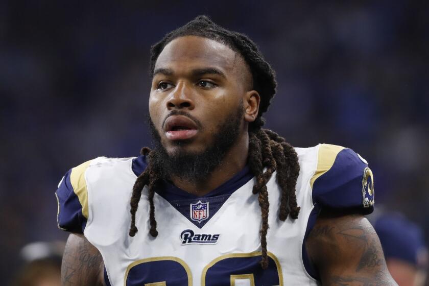 Los Angeles Rams inside linebacker Mark Barron watches against the Detroit Lions during an NFL football game in Detroit, Sunday, Dec. 2, 2018. (AP Photo/Paul Sancya)