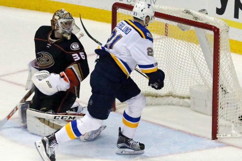 Blues center Patrik Berglund (21) scores the winning goal in overtime past Ducks goalie John Gibson (36) on Sunday at Honda Center.