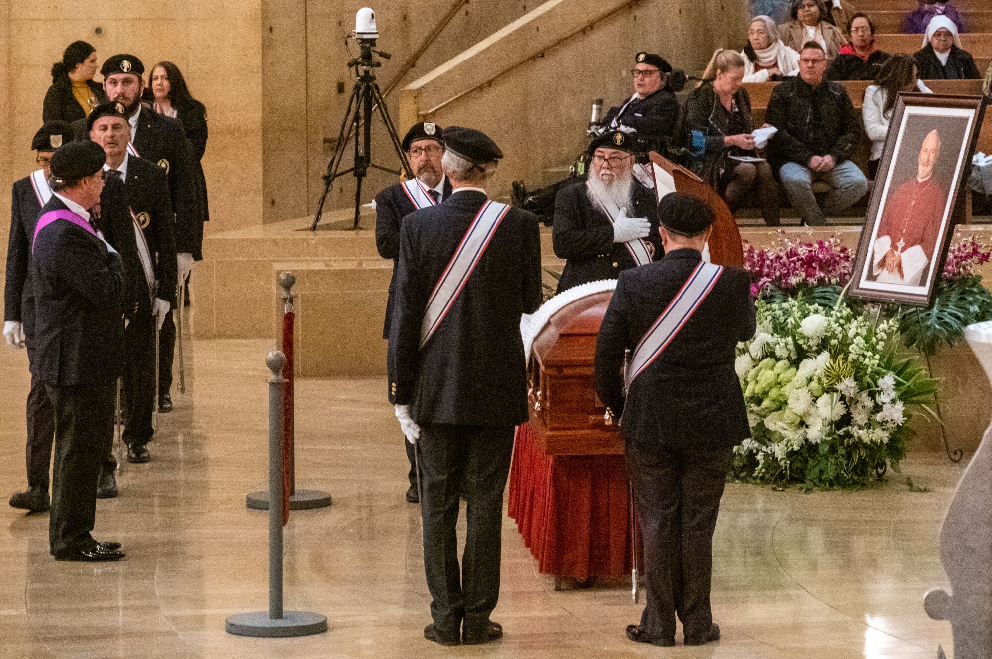 The casket is closed before the vigil Mass 