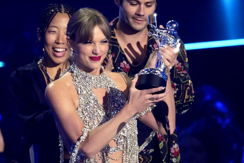 Taylor Swift accepts the award for best longform video