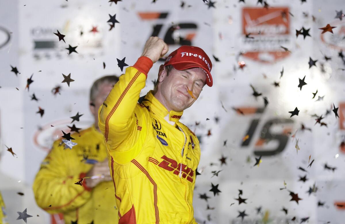 Ryan Hunter-Reay celebrates in Victory Lane after winning the IndyCar Series race on Saturday night at Iowa Speedway.