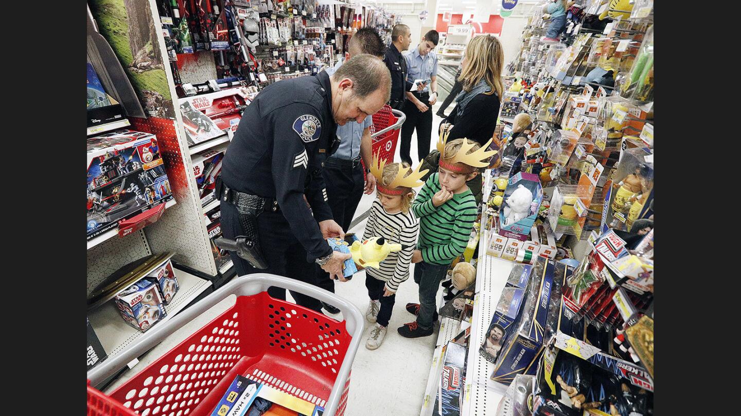 Photo Gallery: Glendale Police's Cops for Kids program shops with children at Target in the Glendale Galleria
