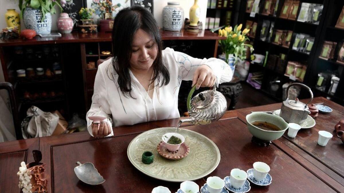 Imen Shan demonstrating a tea tasting prepared in the traditional style of gongfu cha in March 2019. 