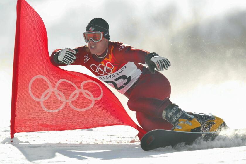 14 Feb 2002: Ryan Wedding of Canada competes in the qualifying round of the men's parallel giant slalom snowboarding event during the Salt Lake City Winter Olympic Games at the Park City Mountain Resort in Park City, Utah. DIGITAL IMAGE. Mandatory Credit: Adam Pretty/Getty Images