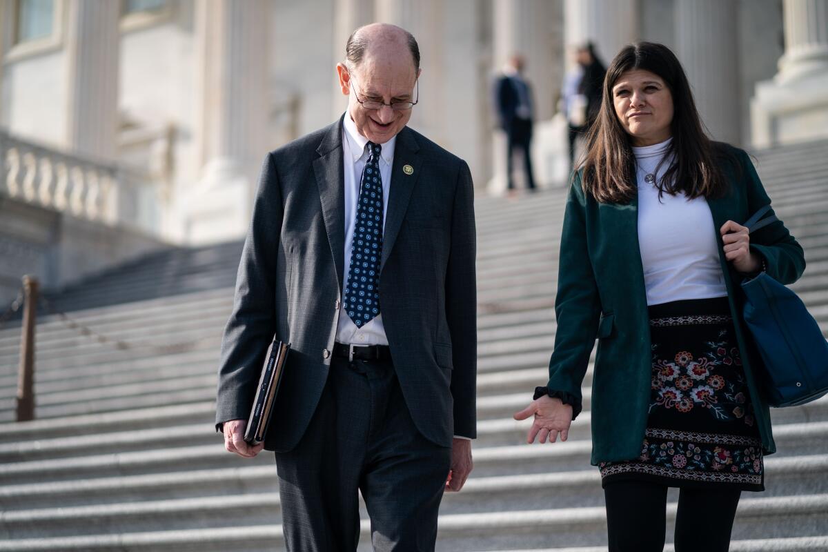     Rep. Brad Sherman (D-CA) and Rep. Haley Stevens (D-MI) talk as they walk 