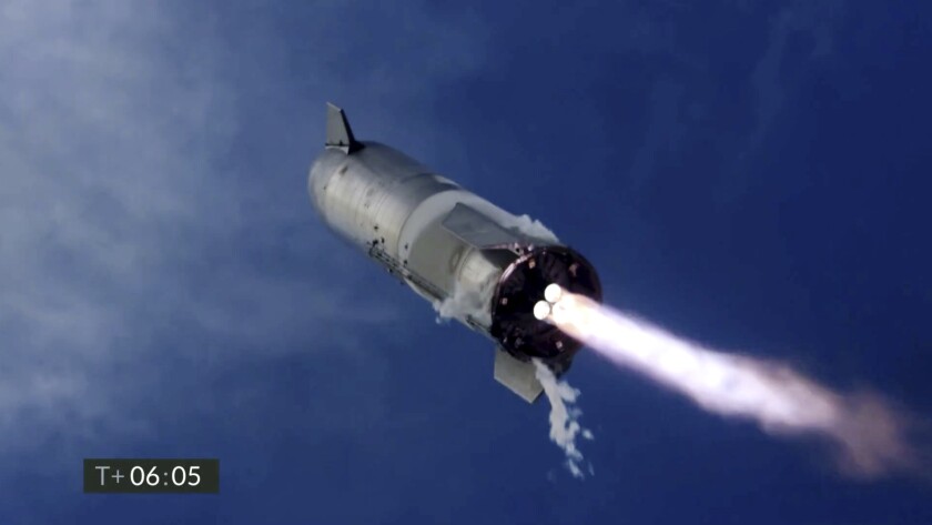 A SpaceX Starship prototype takes a test flight.