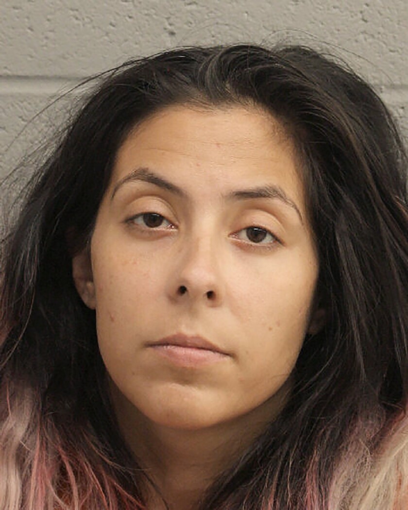This undated photo provided by the Houston Police Department shows Theresa Raye Balboa. Houston police have charged Balboa with evidence tampering in the death of Samuel Olson. Balboa was the girlfriend of Samuel's father. (Houston Police Department via AP)