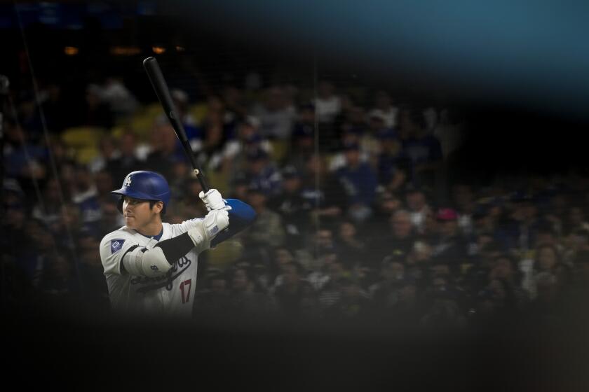 Los Angeles Dodgers' Shohei Ohtani bats during the third inning of a baseball game against the San Diego Padres, Thursday, Sept. 26, 2024, in Los Angeles. (AP Photo/Ashley Landis)