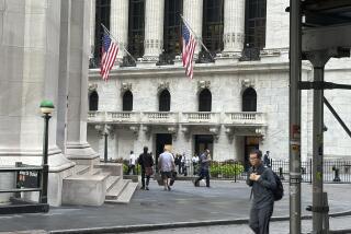 FILE - People pass the New York Stock Exchange, at rear, on Aug. 27, 2024, in New York. (AP Photo/Peter Morgan, File)