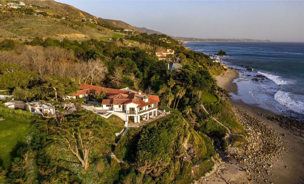 An aerial view of the Malibu home on a bluff above El Sol County Beach..