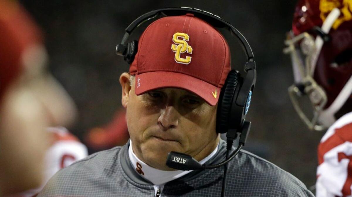 USC Coach Clay Helton is seen on the sideline during a game against Washington on Nov. 12.