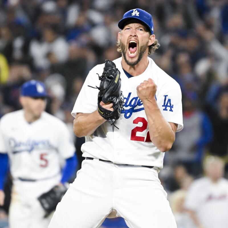 Dodger Clayton Kershaw reacts after striking out New York Met Tommy Pham to end the seventh inning at Dodger Stadium in April. The Dodgers go on to win 5-0, giving Kershaw his 200th win.