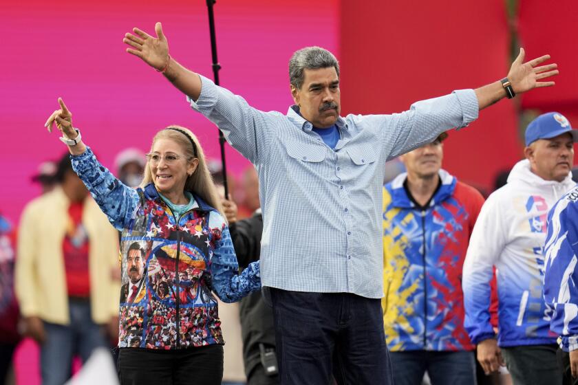 Nicolas Maduro y Cilia Flores durante el cierre de campaña.