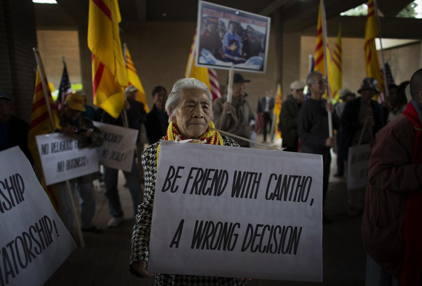 Aibai Dina, 81, of Little Saigon protests with about 200 others against the city of Riverside choosing to arrange a sister city contract with Can Tho in Vietnam on Jan. 29, 2015, outside Riverside City Hall.
