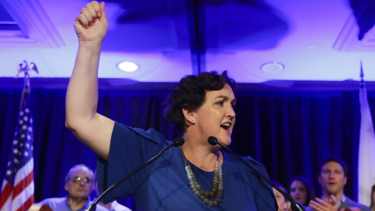 Katie Porter won a seat in inland Orange County despite GOP efforts to portray her as too liberal for the district.