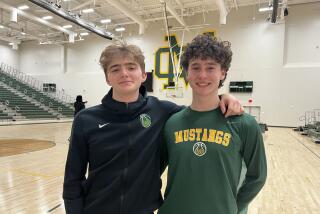 Seniors Will Householter (left) and Dylan Black have led the Mira Costa boys' basketball team to a 23-1 record.