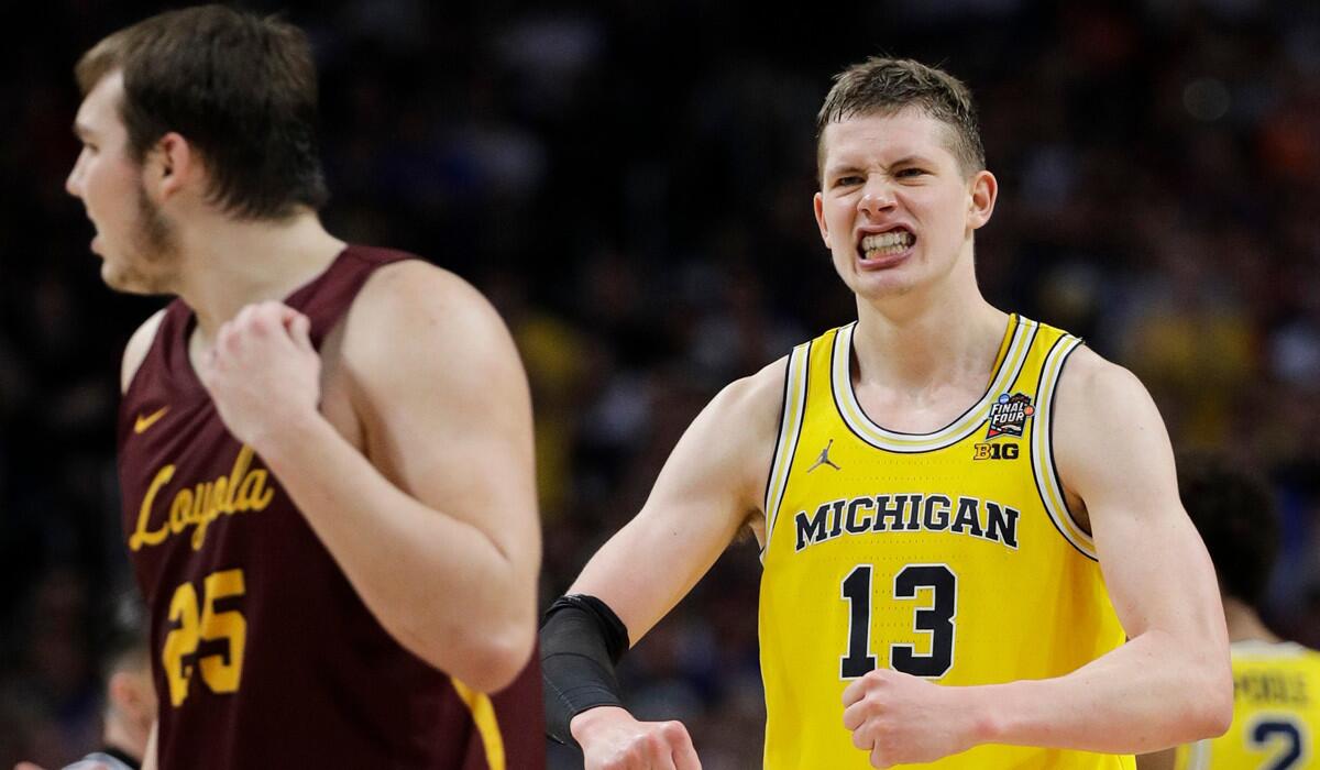 Michigan's Moritz Wagner reacts during the second half in the semifinals of the NCAA tournament against Loyola Chicago on Saturday
