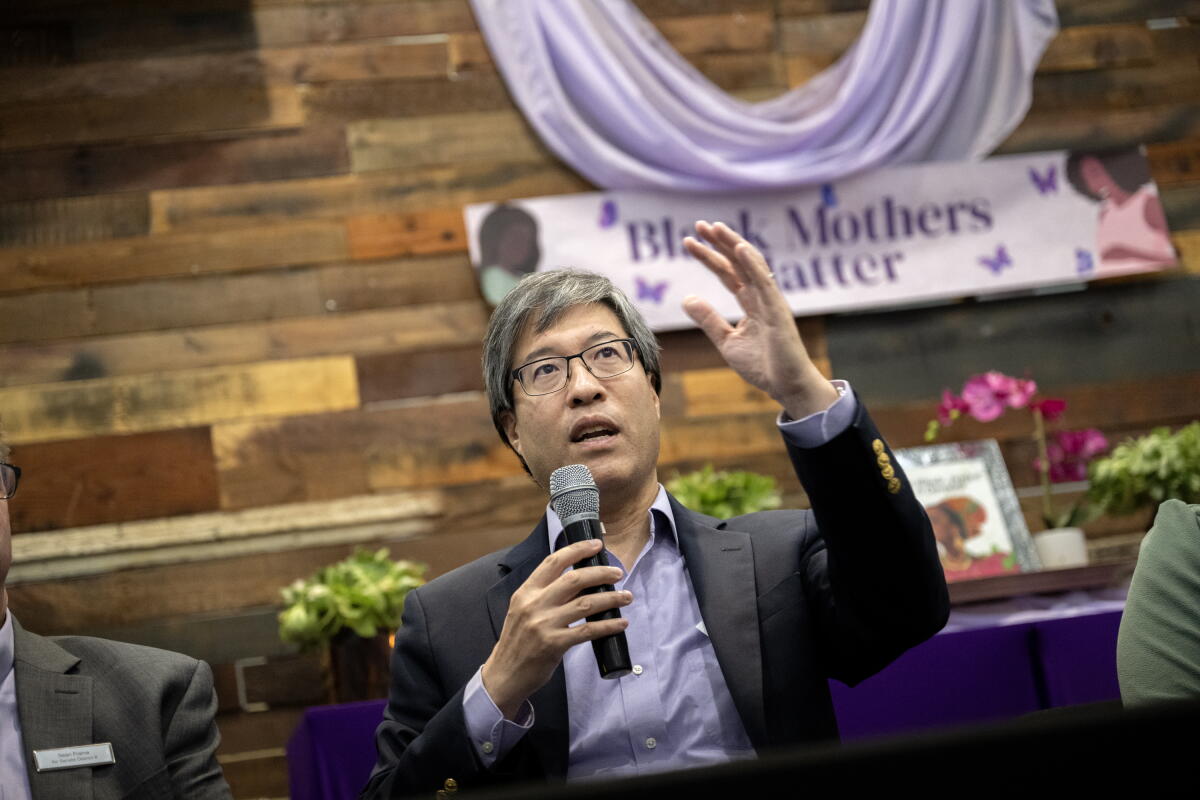 Dr. Richard Pan participates in a discussion during a Black maternal health roundtable at Liberty Towers Church.