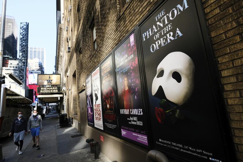 FILE - Broadway posters outside the Richard Rodgers Theatre in New York on May 13, 2020. Broadway theaters may be dark but there will be plenty of new online productions of some of classic plays this fall. “Hamilton” producer Jeffrey Richards on Wednesday unveiled a seven weekly play run of livestreamed works to benefit The Actors Fund. They will stream on Broadway’s Best Shows and ticket buyers can access the events through TodayTix starting at $5. The plays include “The Best Man,” “This Is Our Youth,” Time Stands Still” and “Race” (Photo by Evan Agostini/Invision/AP, File)