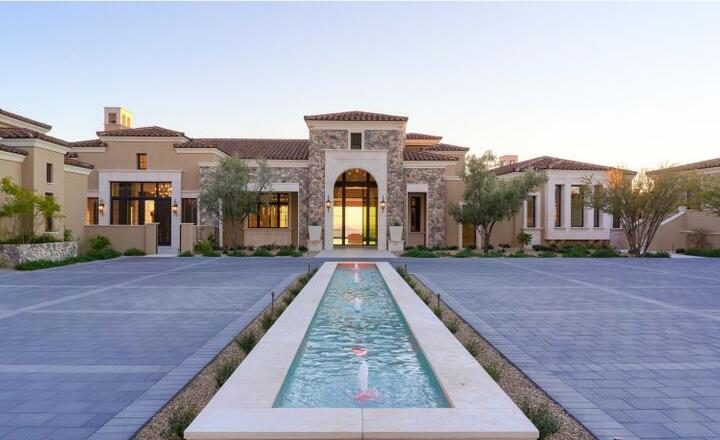 Built in 2021, the scenic mega-mansion is called Altitude and sits atop a peak overlooking Scottsdale and the surrounding mountains.