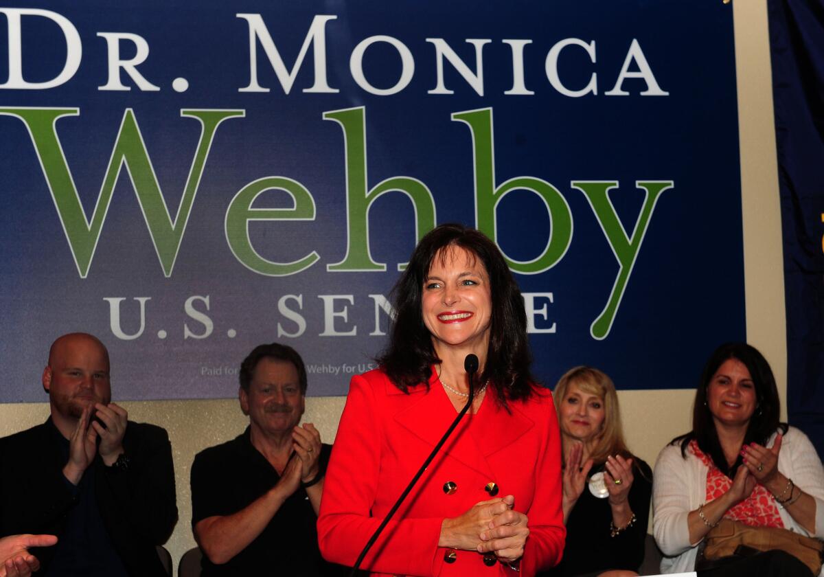 Monica Wehby greets supporters at her headquarters in May.
