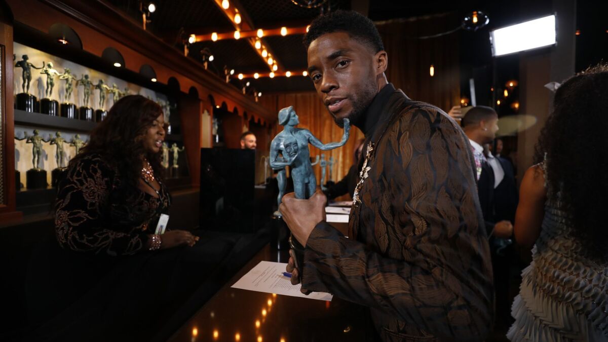 Actor Chadwick Boseman appears backstage at the 25th Screen Actors Guild Awards on Jan. 27, 2019.