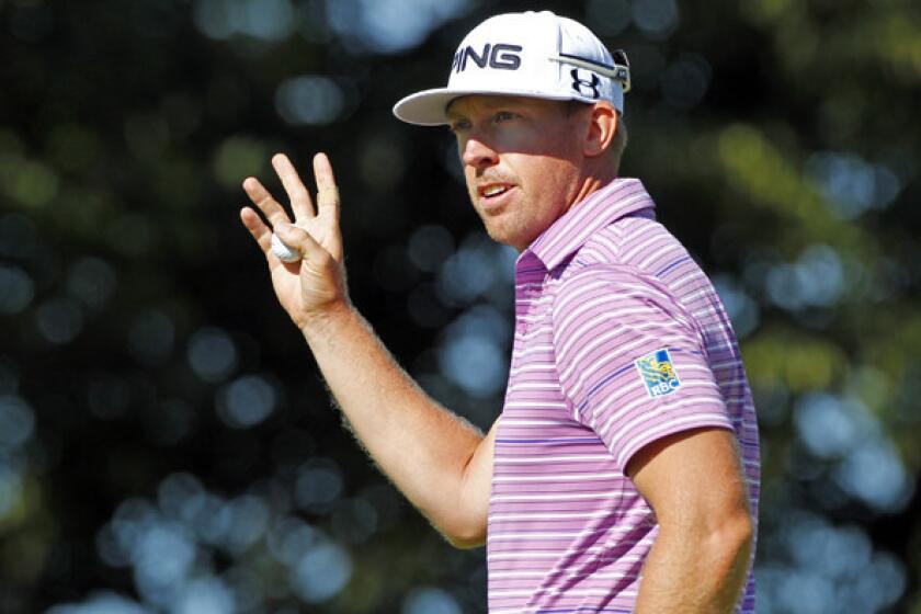 Hunter Mahan acknowledges the applause of the gallery after a birdie at No. 16 during the second round of the Canadian Open on Thursday.