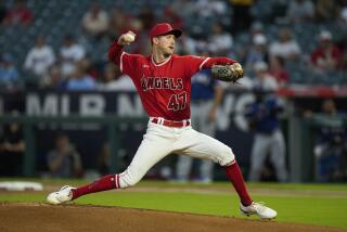 Los Angeles Angels starting pitcher Griffin Canning throws against the Texas Rangers during the first inning of a baseball game Wednesday, Sept. 27, 2023, in Anaheim, Calif. (AP Photo/Jae C. Hong)