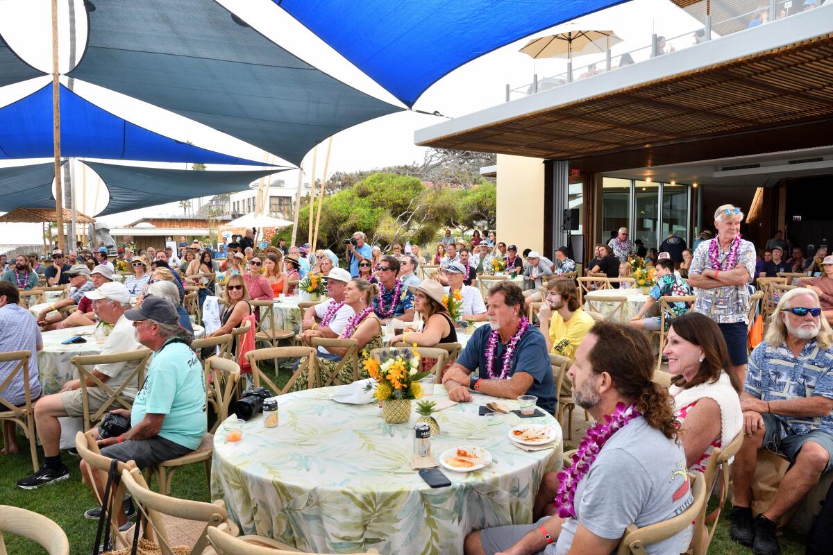 Guests attend last year's Luau & Legends of Surfing Invitational.