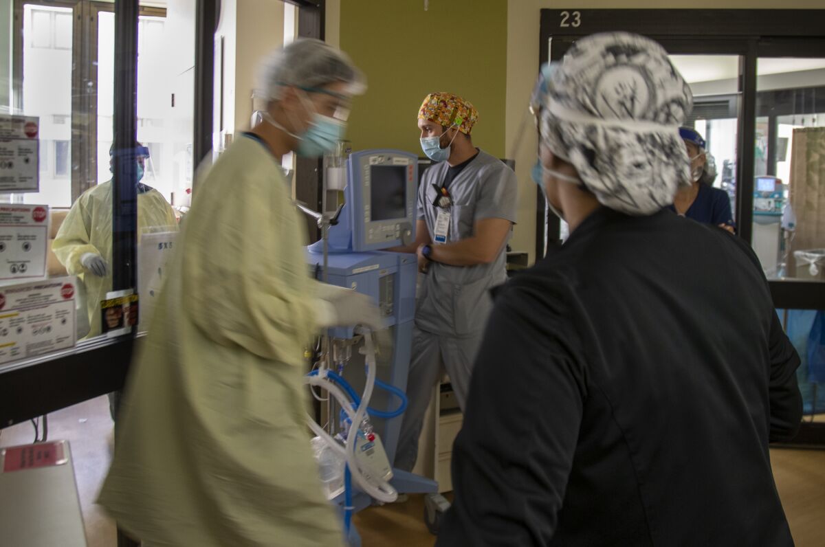 An ICU team prepares to intubate a COVID-19 patient at Loma Linda University Medical Center in San Bernardino County