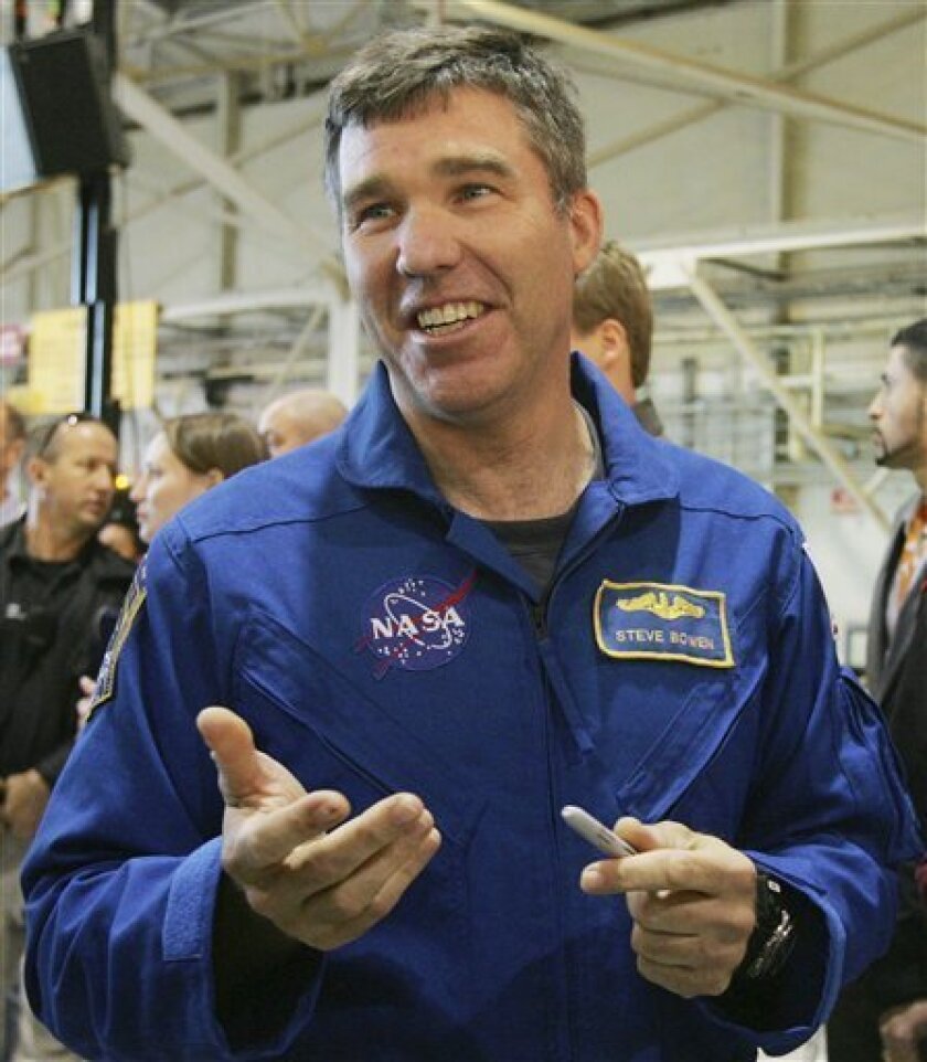 FILE - This Dec. 1, 2008 picture shows astronaut Steve Bowen at NASA's Johnson Space Center in Houston. NASA is replacing a member of space shuttle Discovery's crew who crashed his bicycle over the weekend. On Wednesday, Jan. 19, 2011, NASA removed Timothy Kopra from the crew and added veteran spaceman Stephen Bowen. Bowen flew on the most recent shuttle flight, last May. Bowen will assume Kopra's spacewalking duties during the 11-day flight. That flight has been on hold since November because of fuel tank cracks. (AP Photo/Margaret Bowles, File)