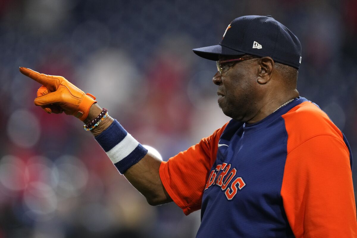 Houston Astros Dusty Baker points during a game.
