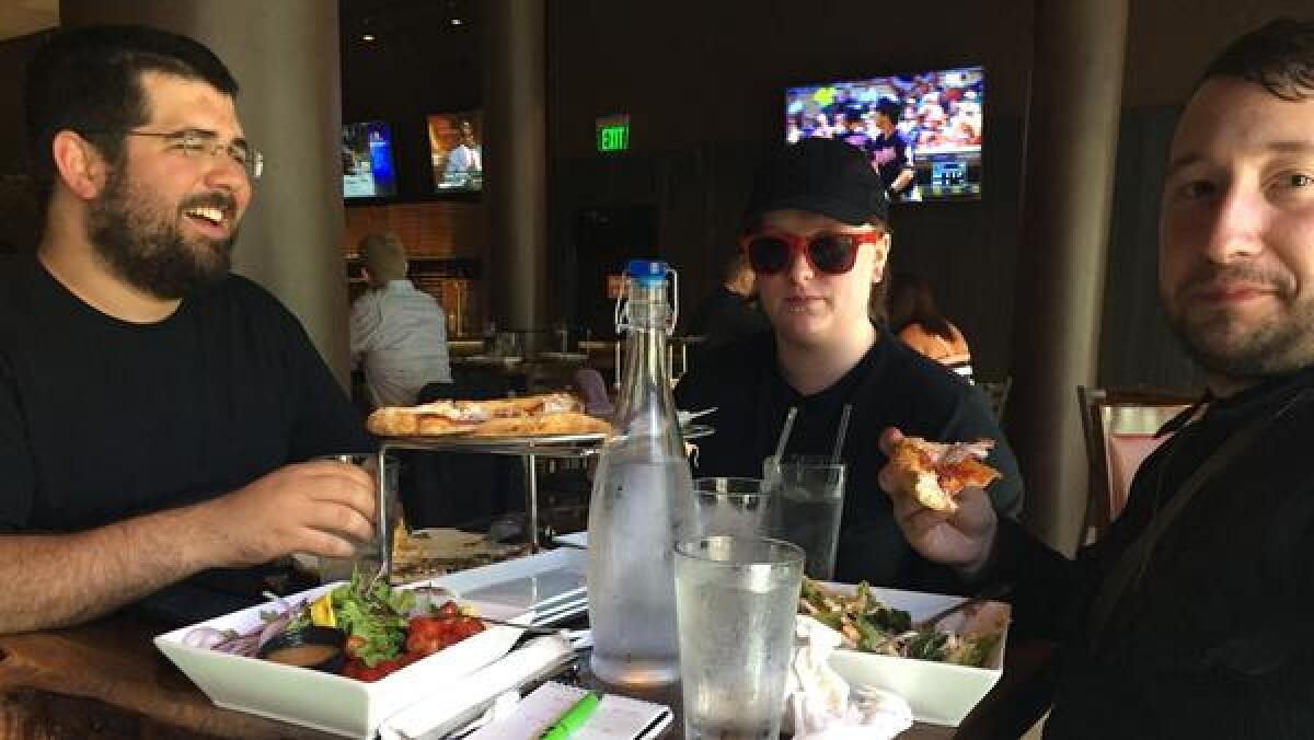 Matthew Heimbach, left, Katherine Amsel and Scott Hess, all members of the white nationalist Traditionalist Worker Party, in July 2016.