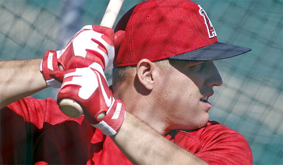 Angels outfielder Mike Trout takes some batting practice reps during the team's spring training in Arizona on Feb. 18, 2013.