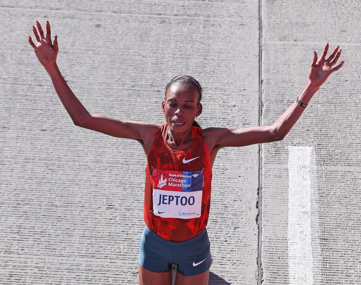 Rita Jeptoo of Kenya celebrates after winning of the Chicago Marathon on Oct. 12.